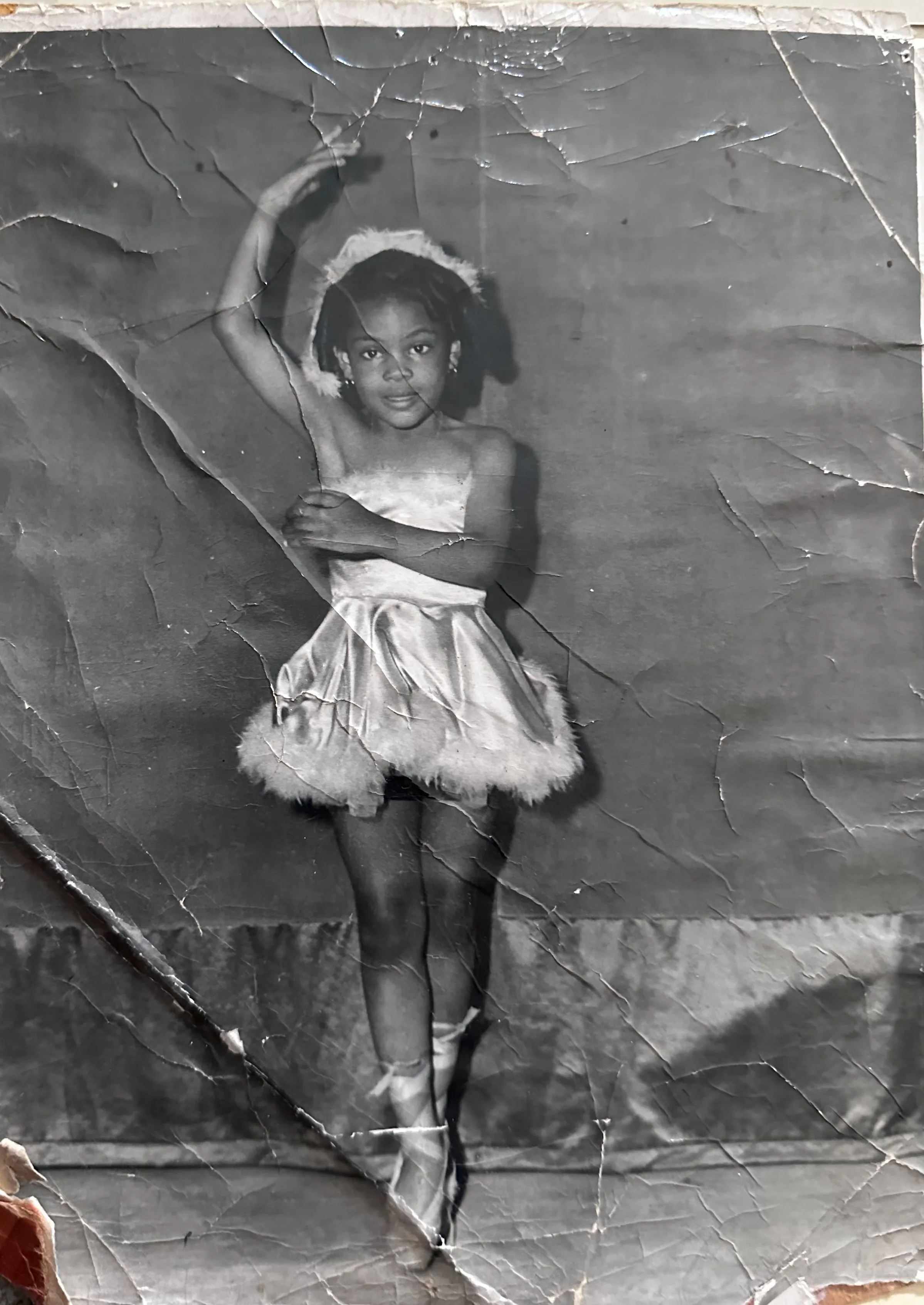 Mary Johnson at a young age and dancing
